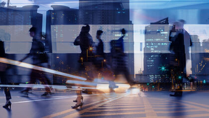 Overexposure photo of people walking on a street