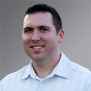 Trace Armstrong headshot