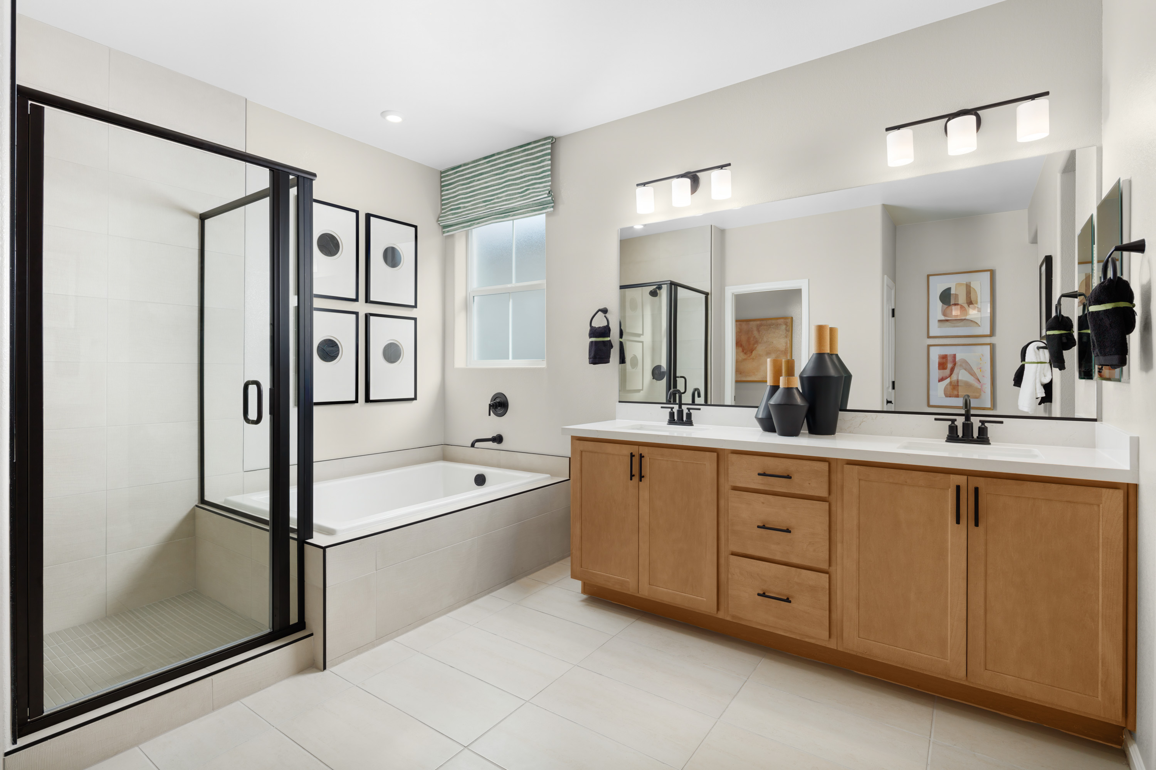 primary bathroom with separate tub and shower