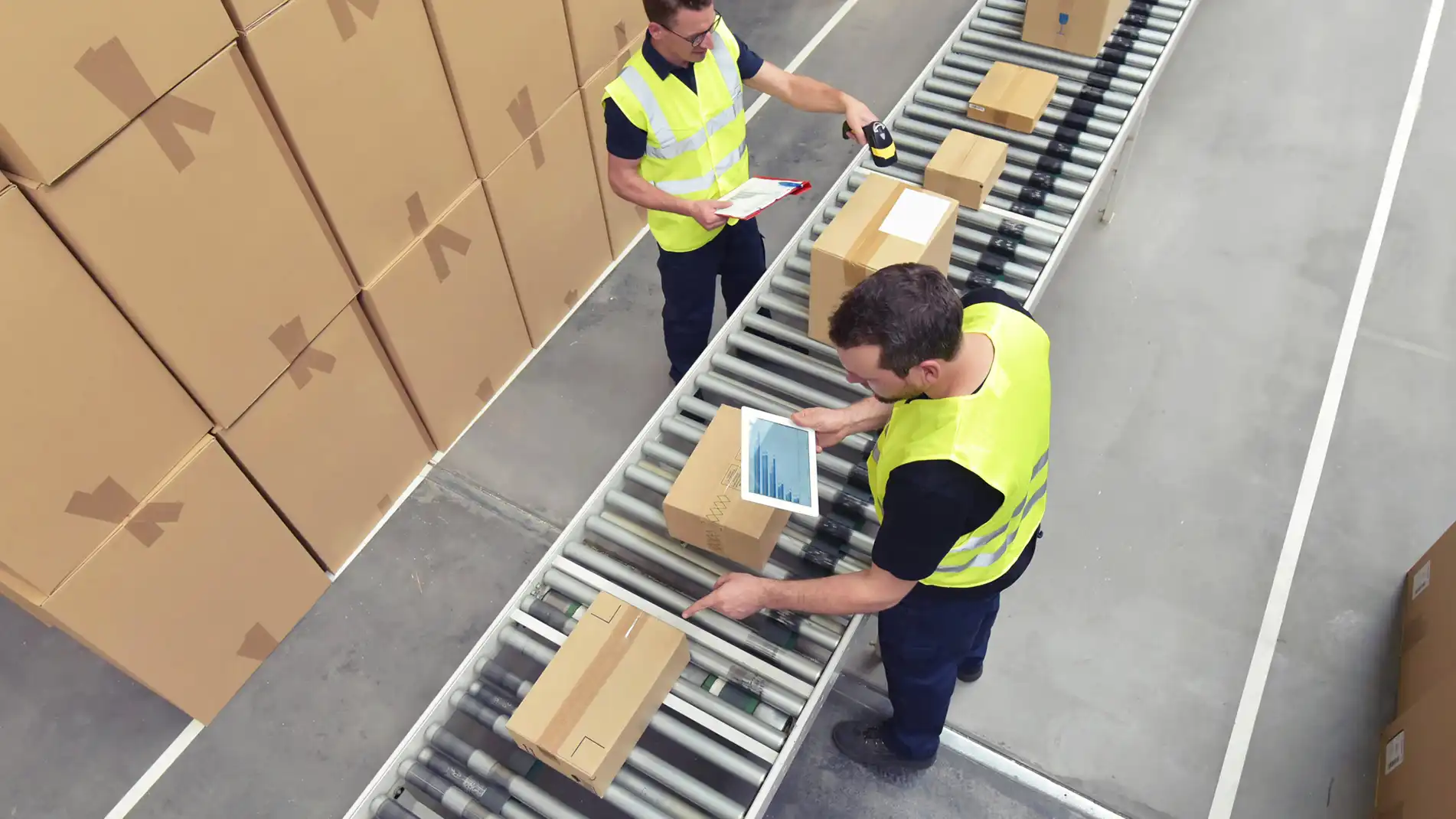 Automated-Order-Exception-Management-In-Page-2.webp Image of a worker scanning a package on a conveyor belt.