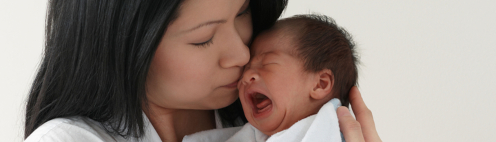 Mother with crying baby