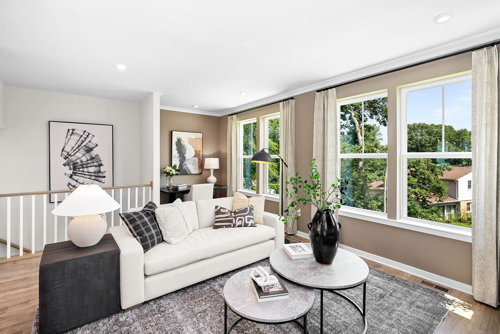 great room with solid flooring & lots of light