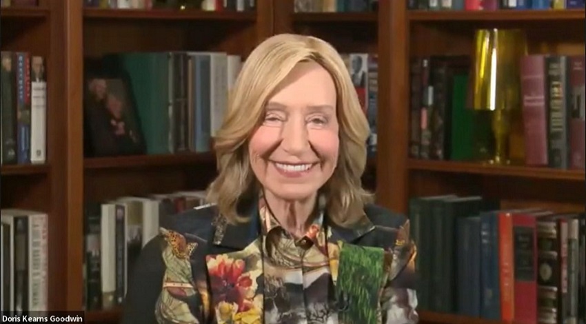 A screenshot of Doris Kearns Goodwin during her online lecture, with a bookshelf in the background