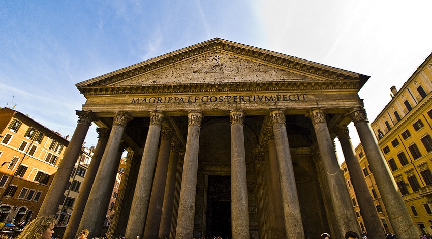 The stone columns and roof of the exterior of the Pantheon