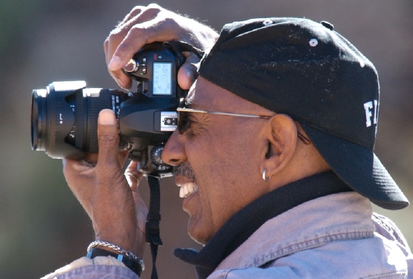 Richard points his camera at his subject