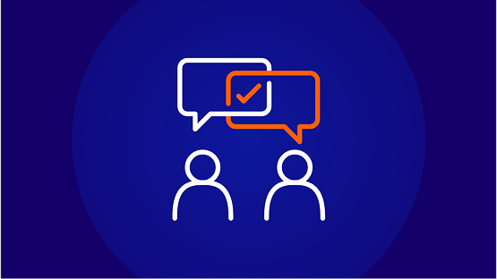 An icon of two people outlines (white) with two overlapping speech bubbles above them. One speech bubble is white, and the other, which overlaps it, is orange and contains a white checkmark. The background is a solid dark blue circle.