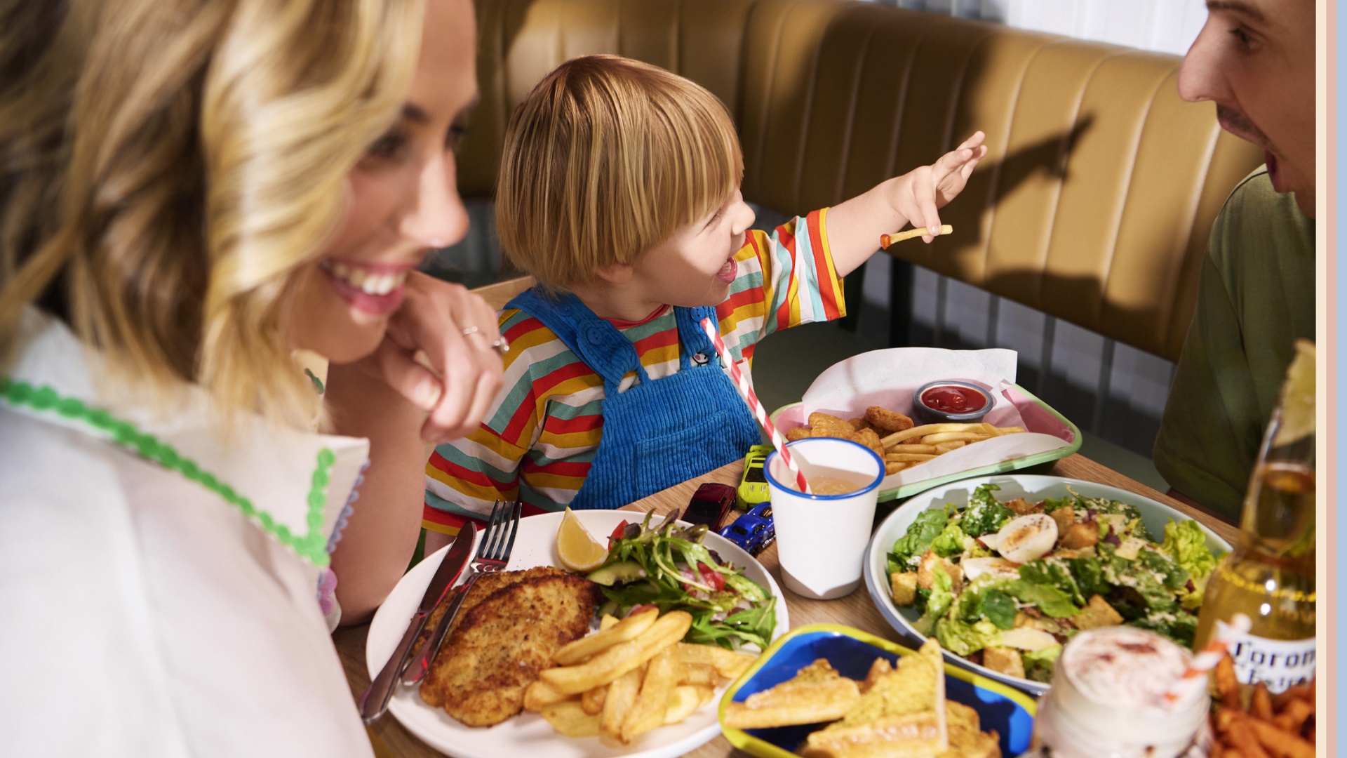 Family enjoying dishes dining in The Piazza