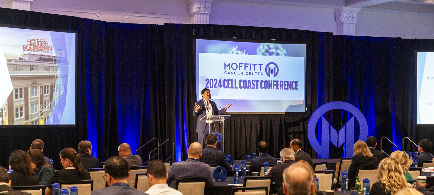 Dr. Patrick Hwu on stage welcoming attendees to the Inaugural Cell Coast Conference
