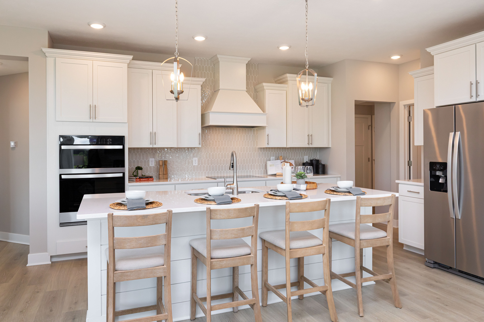 kitchen with white cabinets and tile backsplash
