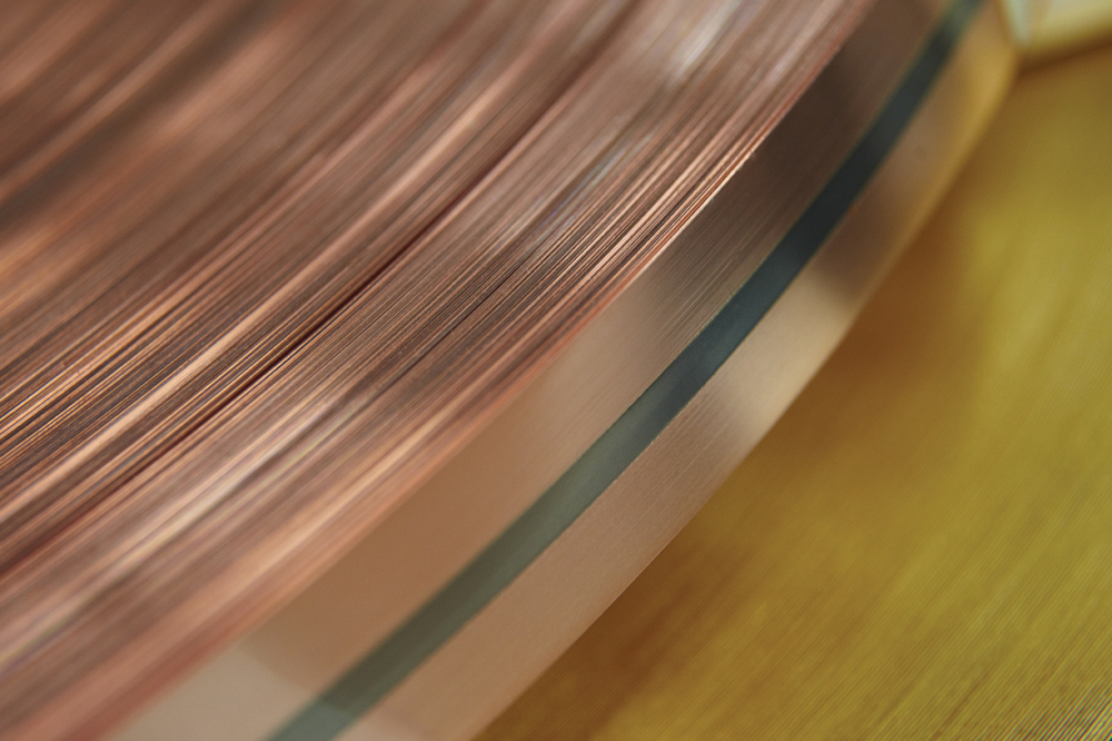 Copper strip cladding