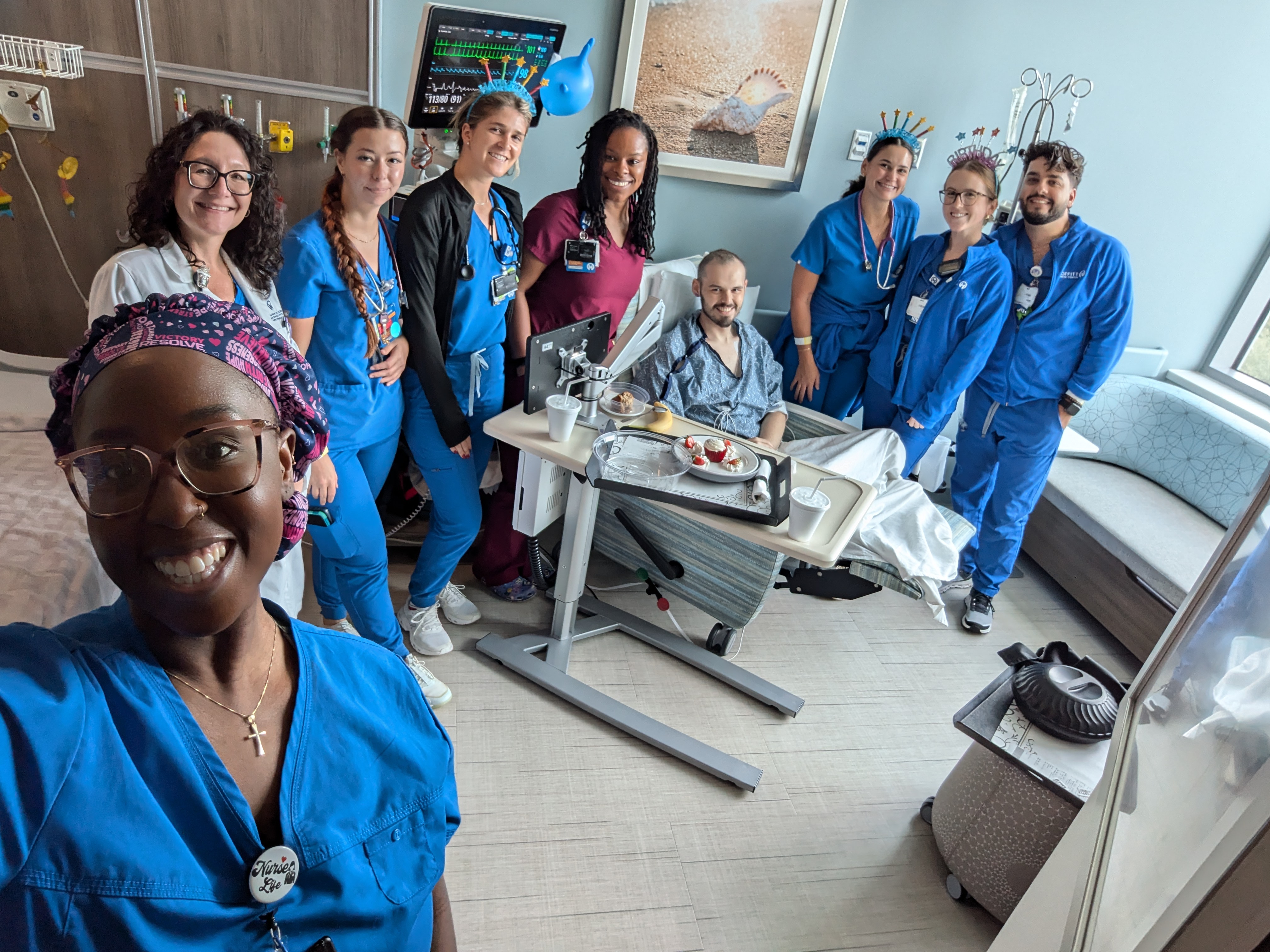 Moffitt nurses surprise Cole with a birthday party for his 21st birthday.