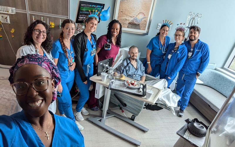 Moffitt nurses surprise Cole with a birthday party for his 21st birthday.