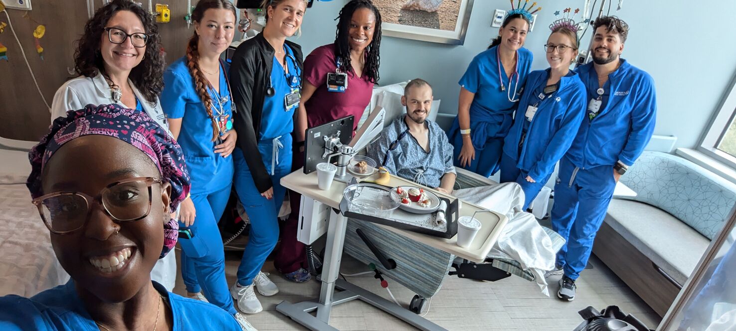Moffitt nurses surprise Cole with a birthday party for his 21st birthday.