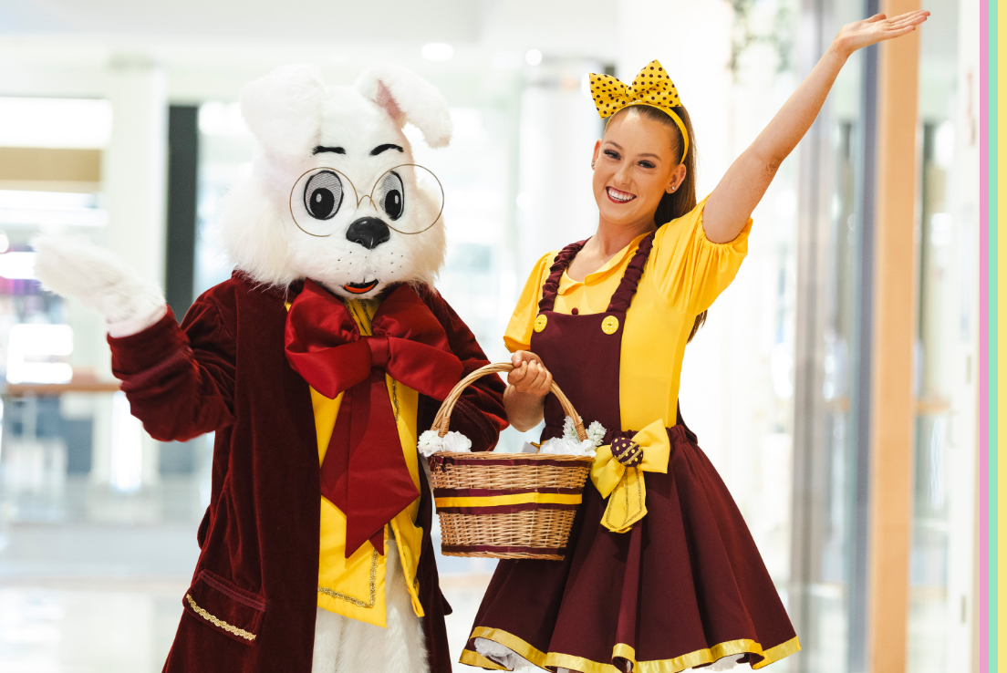 Easter Bunny character and woman holding easter basket