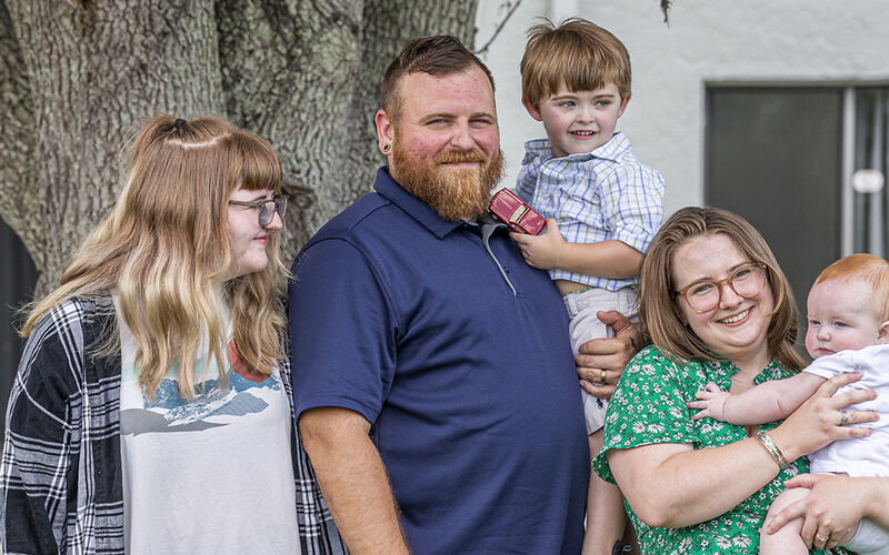 Dallas Carroll was diagnosed with metastatic HER2-positive breast cancer a week after giving birth. A new immunotherapy treatment has given her hope. From left: Dallas’ stepdaughter Riley, husband Jeremy, and sons Finnry and Dakota.