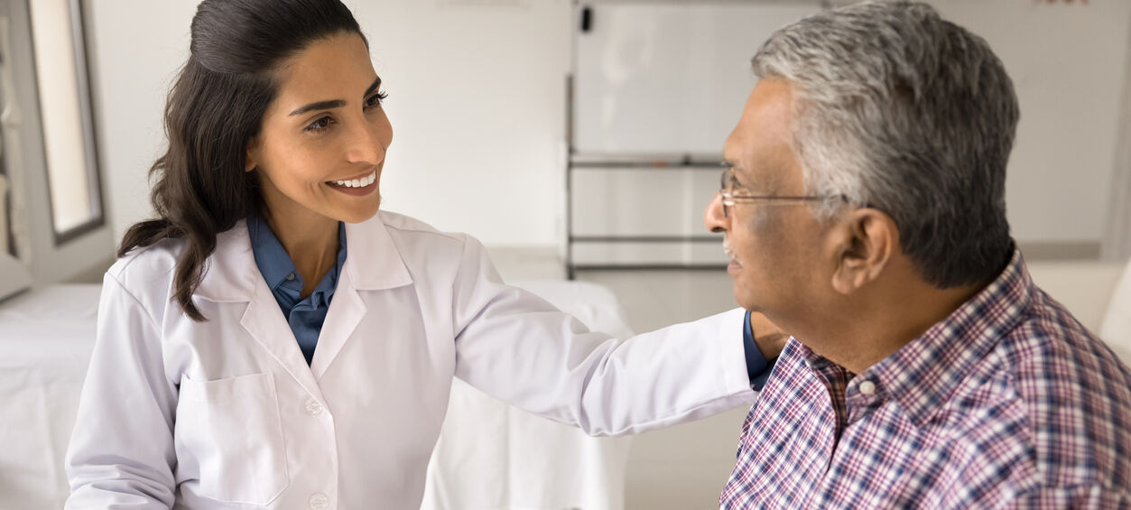 Doctor meets with male cancer patient