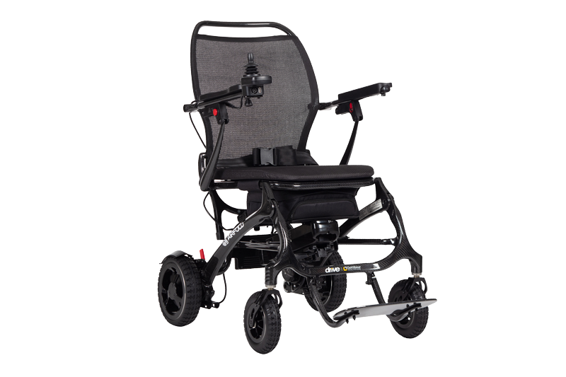 A lightweight electric wheelchair with a black mesh backrest, cushioned seat, and compact folding frame. It has four wheels, adjustable armrests, a joystick control on one armrest, and a slim black design with subtle metallic accents.