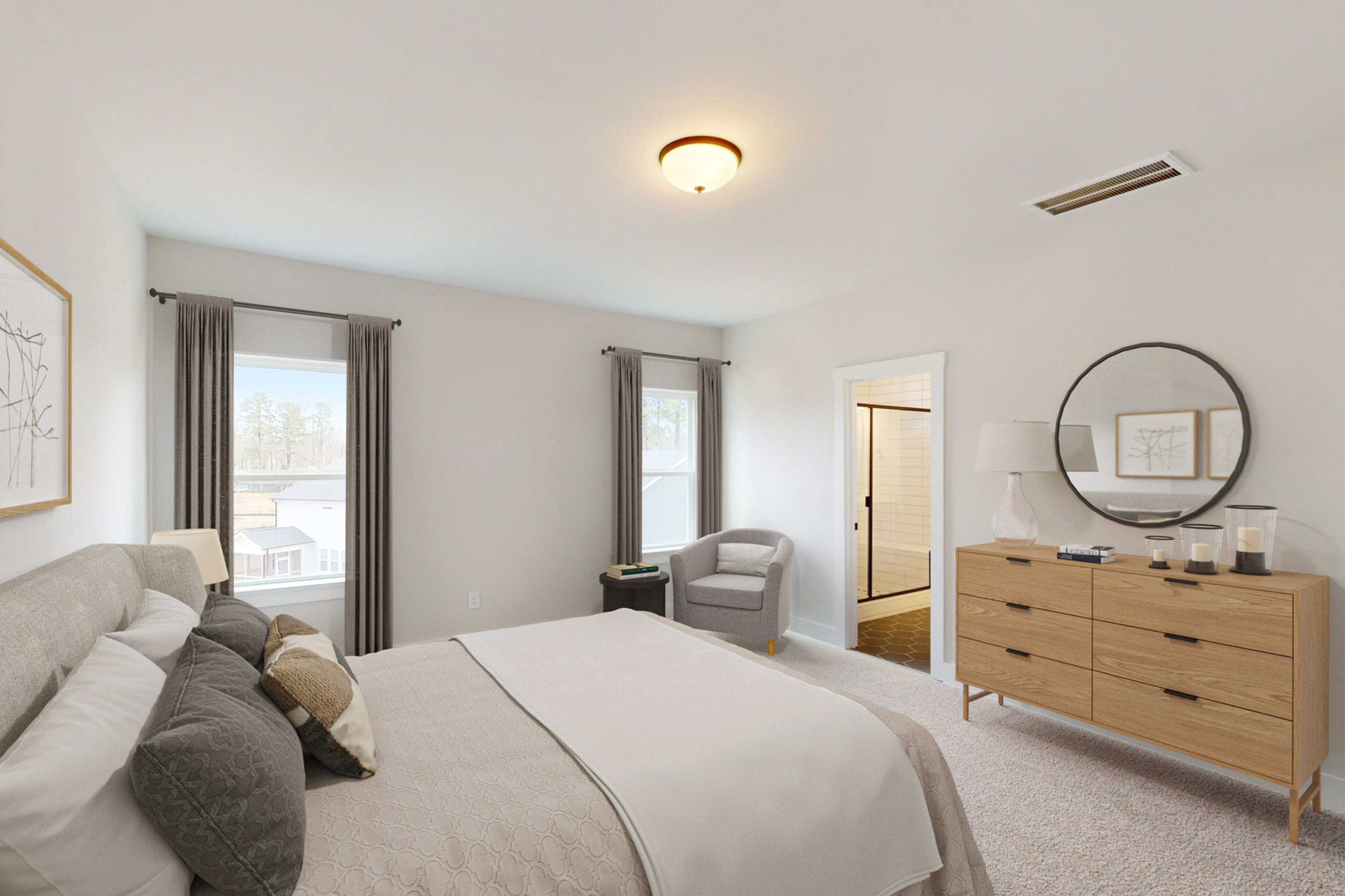 large bedroom with king bed and dresser
