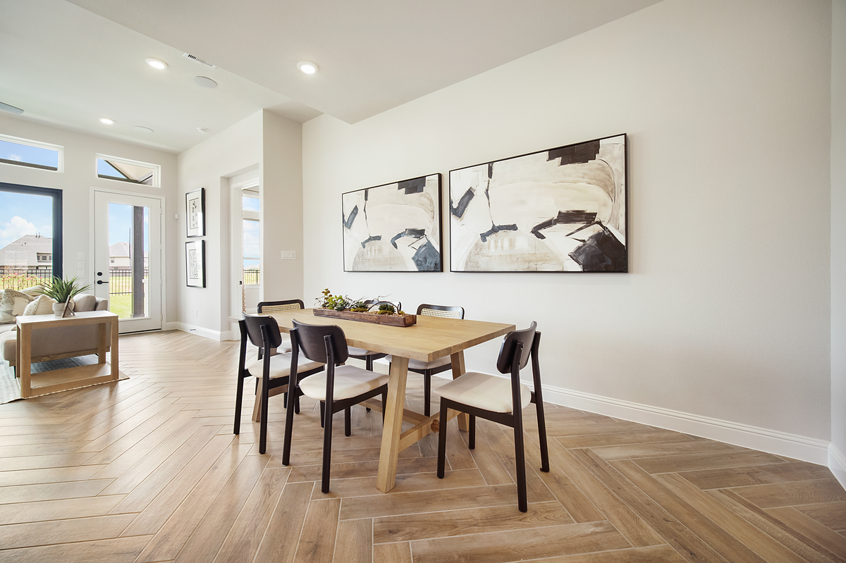 casual dining room with high ceilings