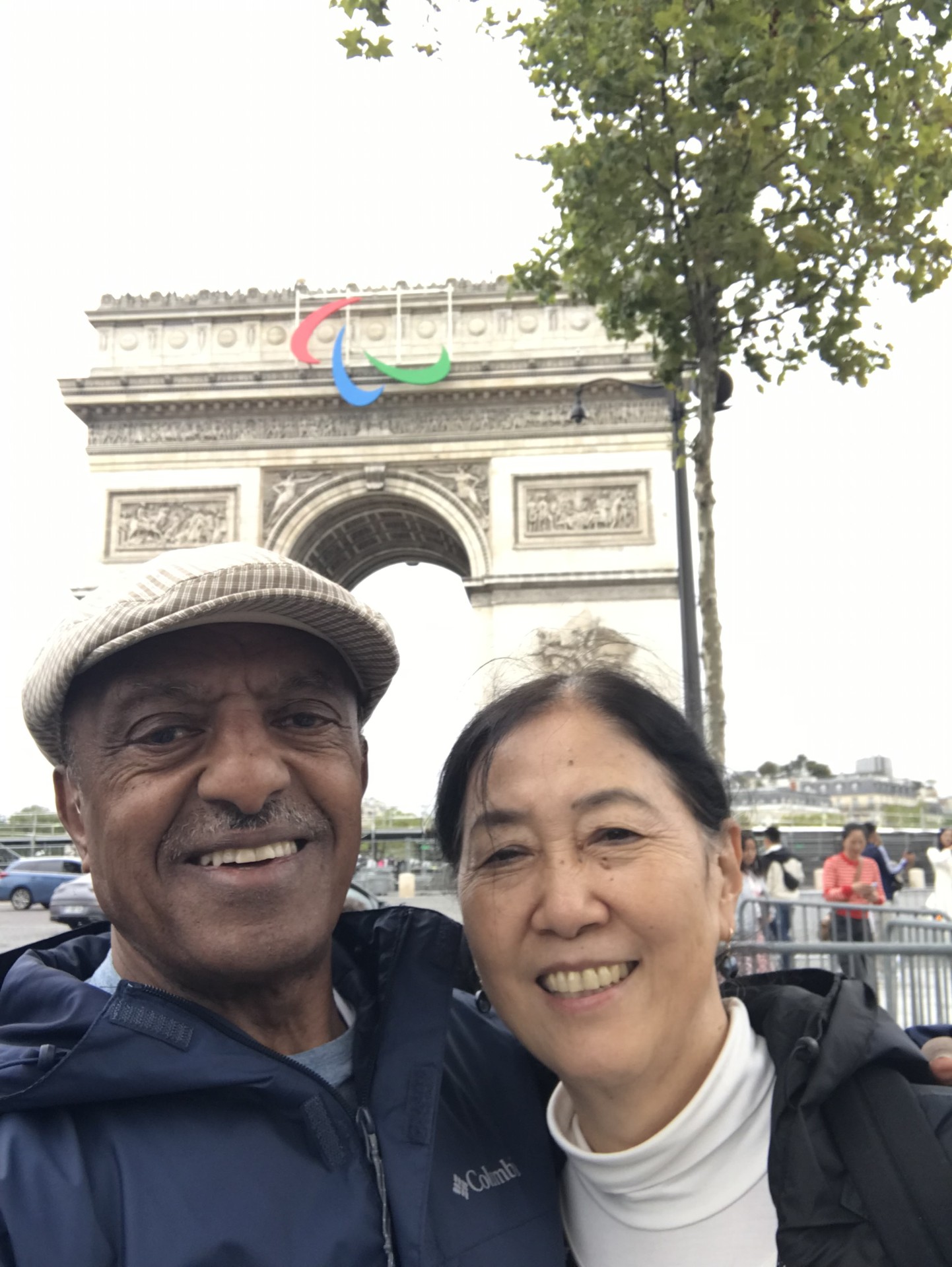 Fumie and Ahmed in front of the Champs-Élysées