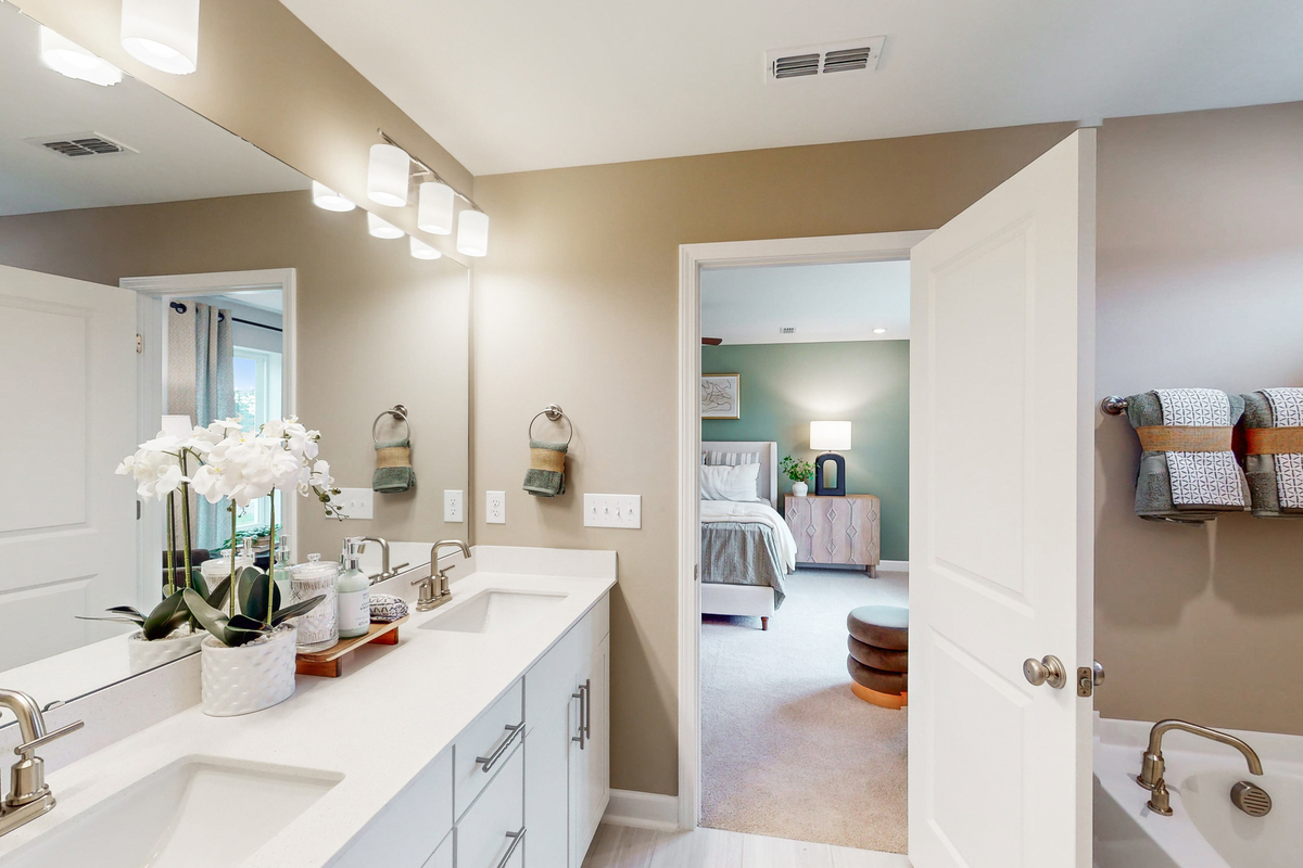 bathroom with two sinks and white counters