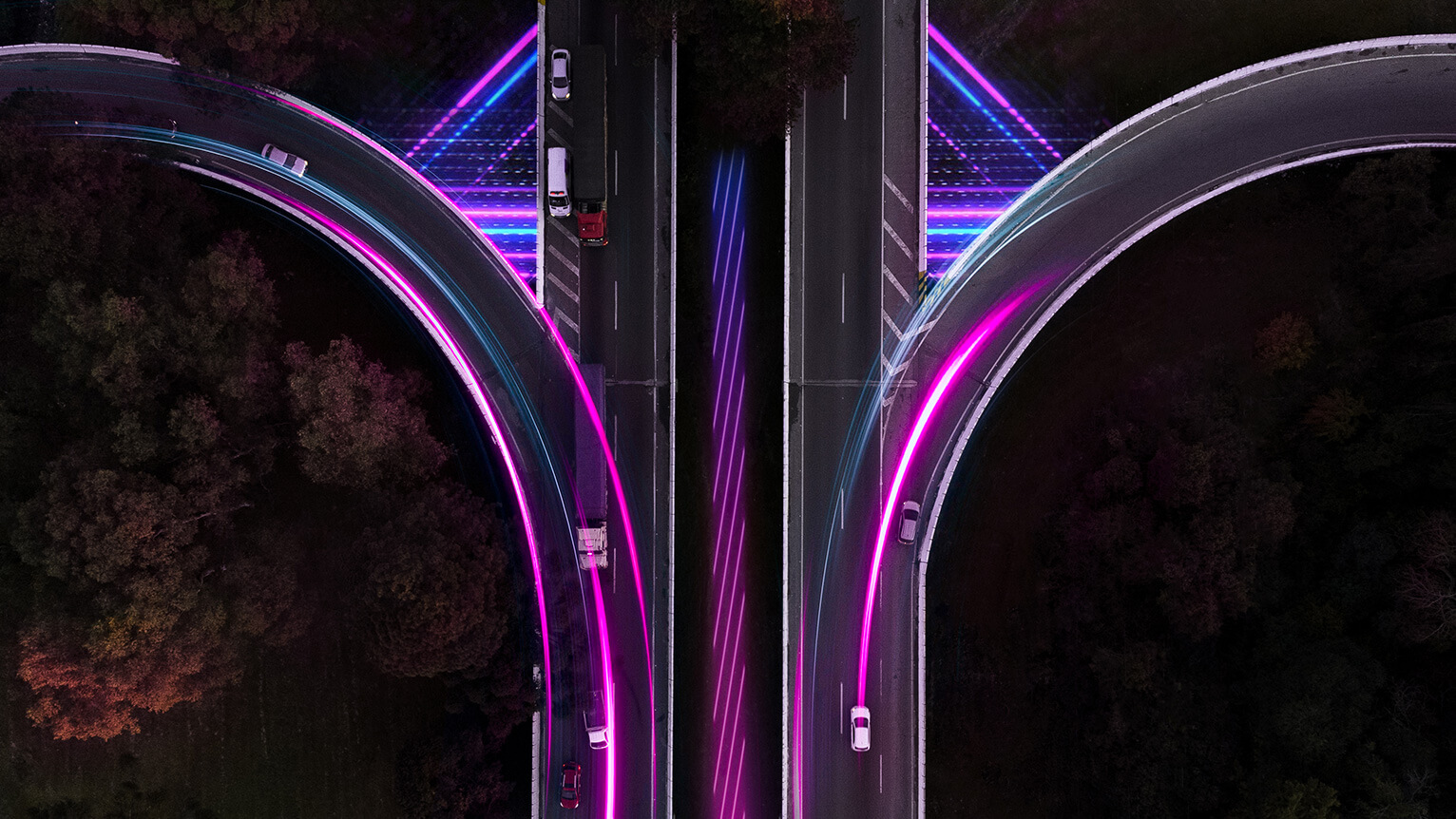Abstract image of trucks on a highway.