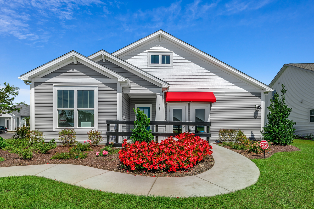 gray exterior vinyl siding with white trim
