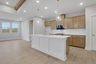 kitchen with center island open to dining room