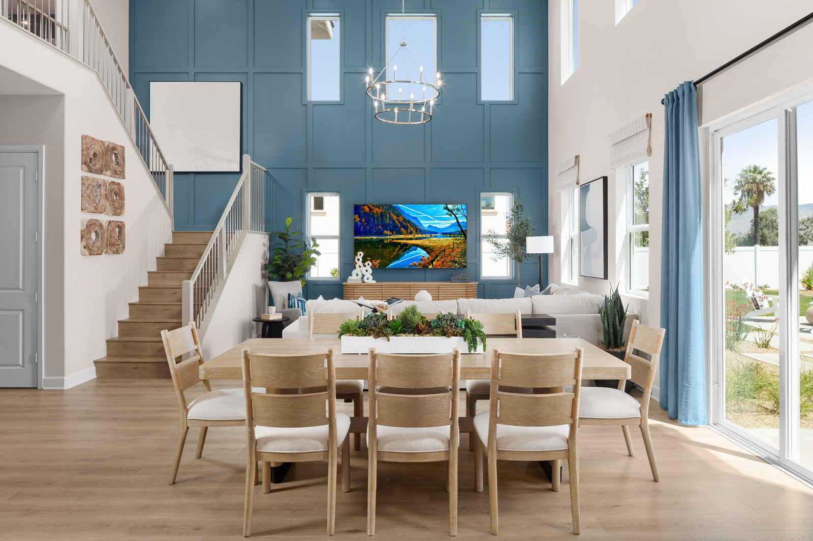 dining area near great room with tall ceilings