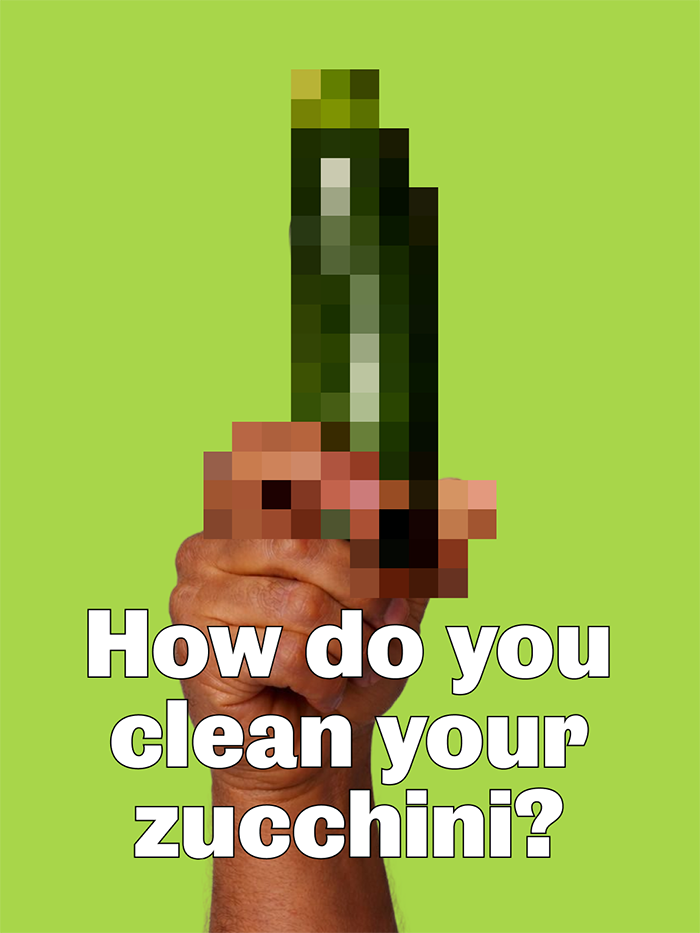 hand holding zuccini