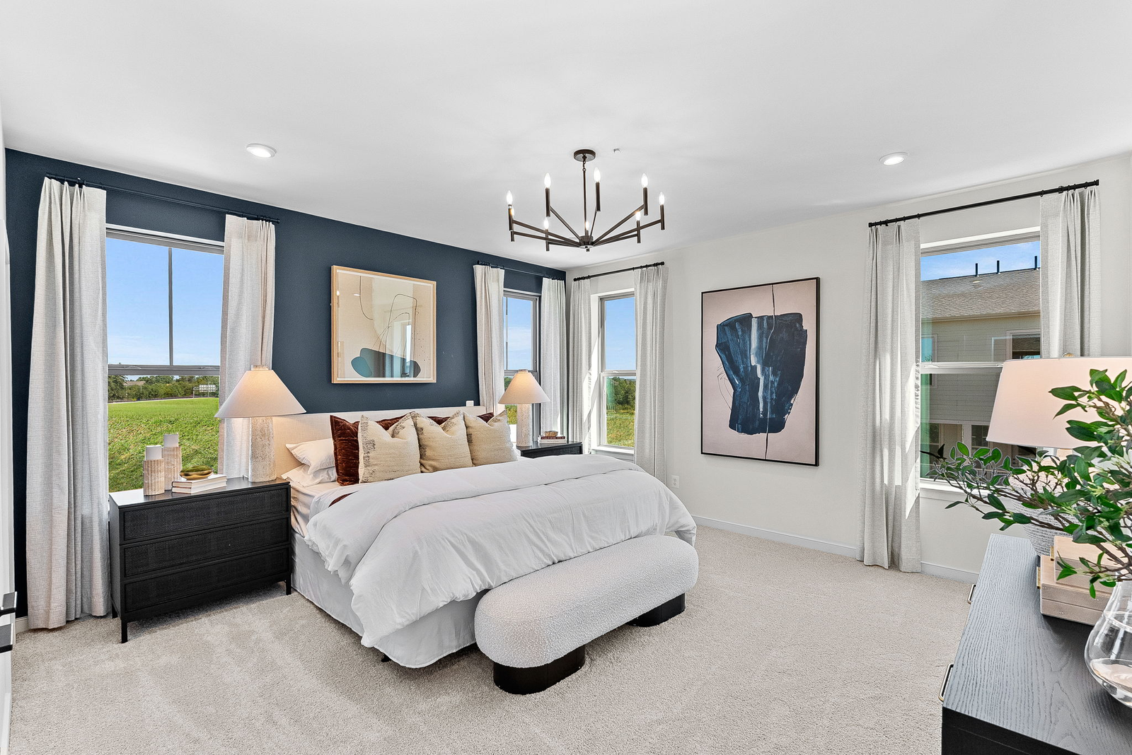 primary bedroom with bed and nightstand