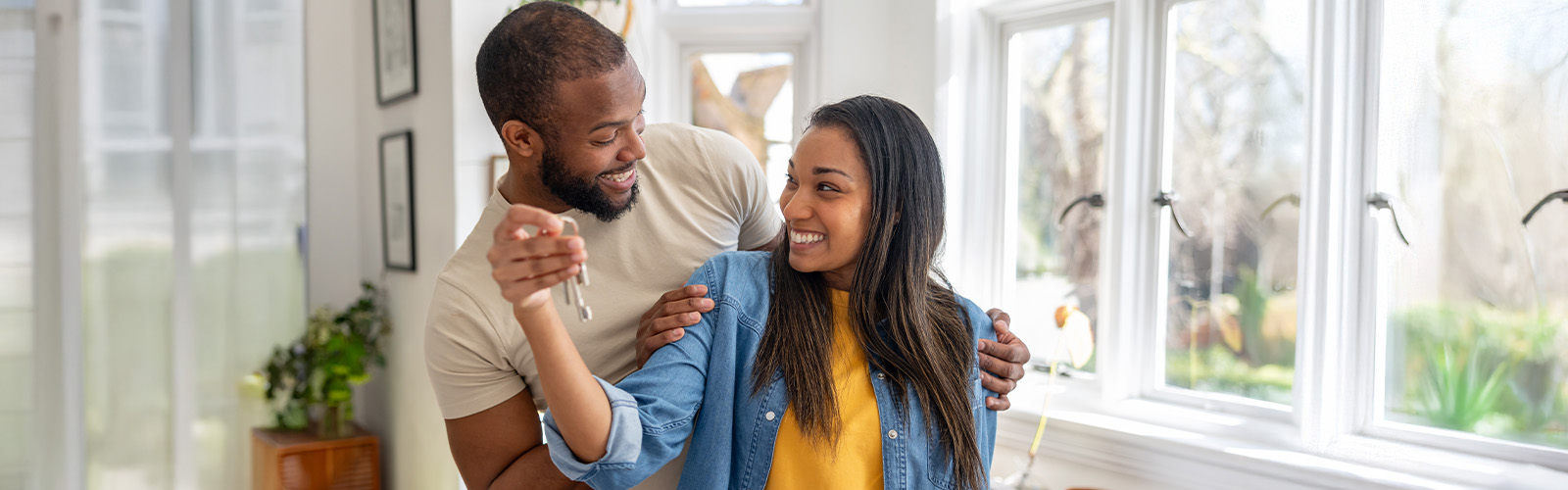 A happy couple who just bought a home