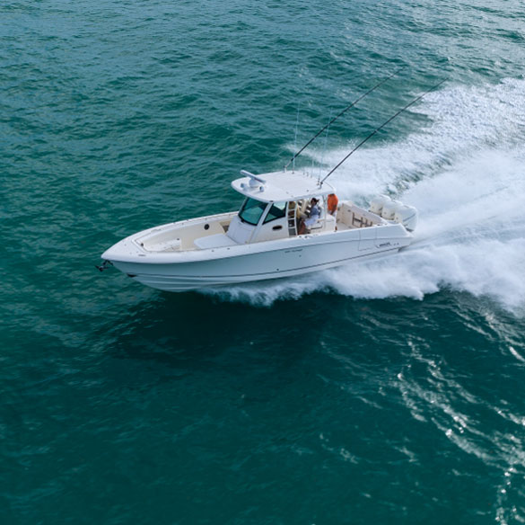 Aerial photo of speeding sportfishing powerboat fitted with Lenco trim tabs