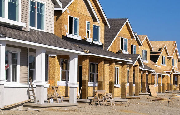 Row of partially finished house in a under construction development