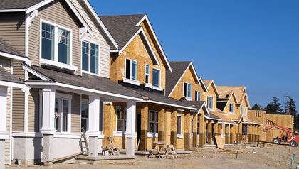 Row of partially finished house in a under construction development