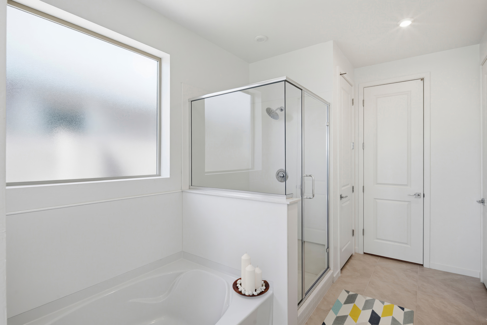 spacious bathroom with soaking tub and walk-in shower