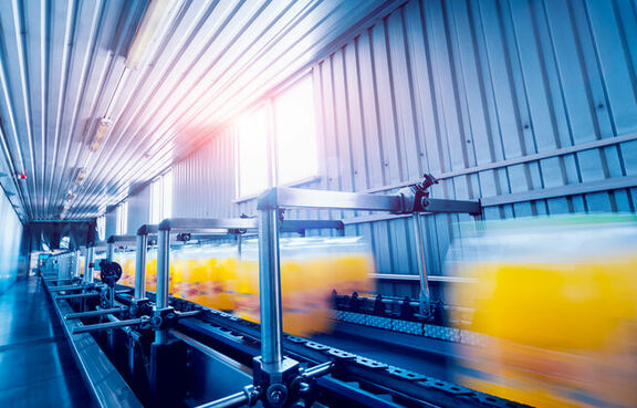 In motion view of manufacturing packaging line