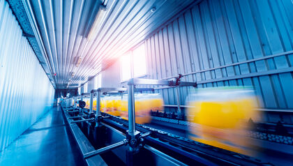 In motion view of manufacturing packaging line