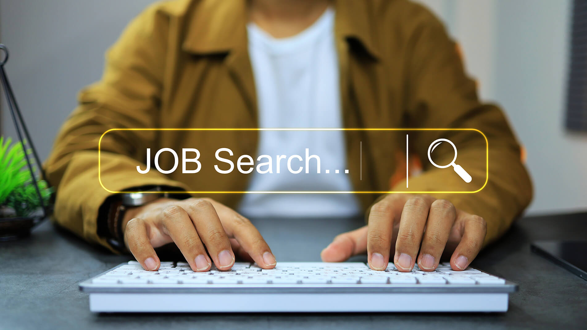 JobSearch-content-media-row.jpg Image of a man typing on a keyboard.