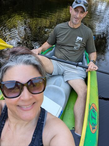 Karen kayaking with her husband