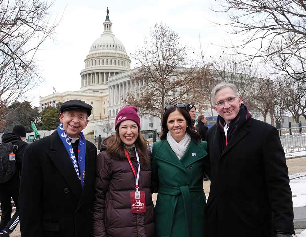 Supreme Chaplain Archbishop William Lori and Supreme Knight Patrick Kelly and Vanessa Kelly stand outside the U.S. Capitol with Jennie Bradley Lichter.