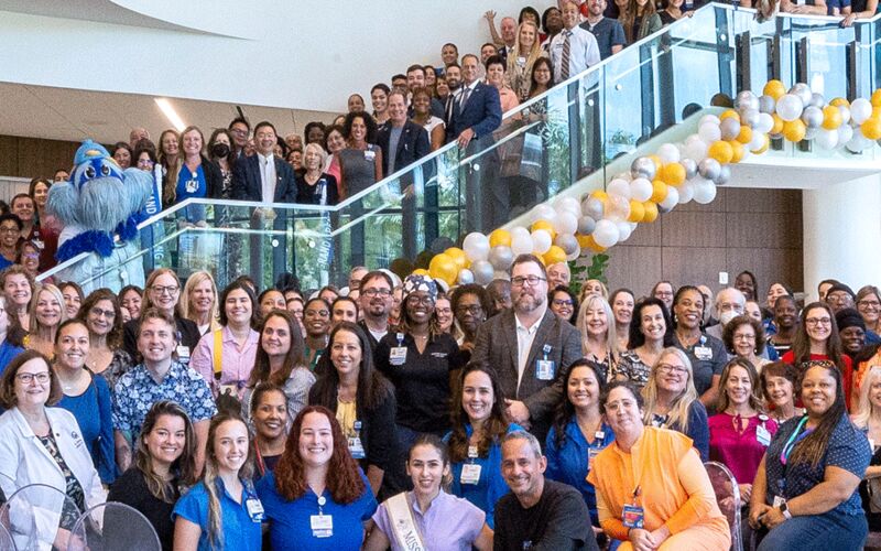 Team members celebrate the grand opening of Moffitt McKinley Hospital in July 2023.