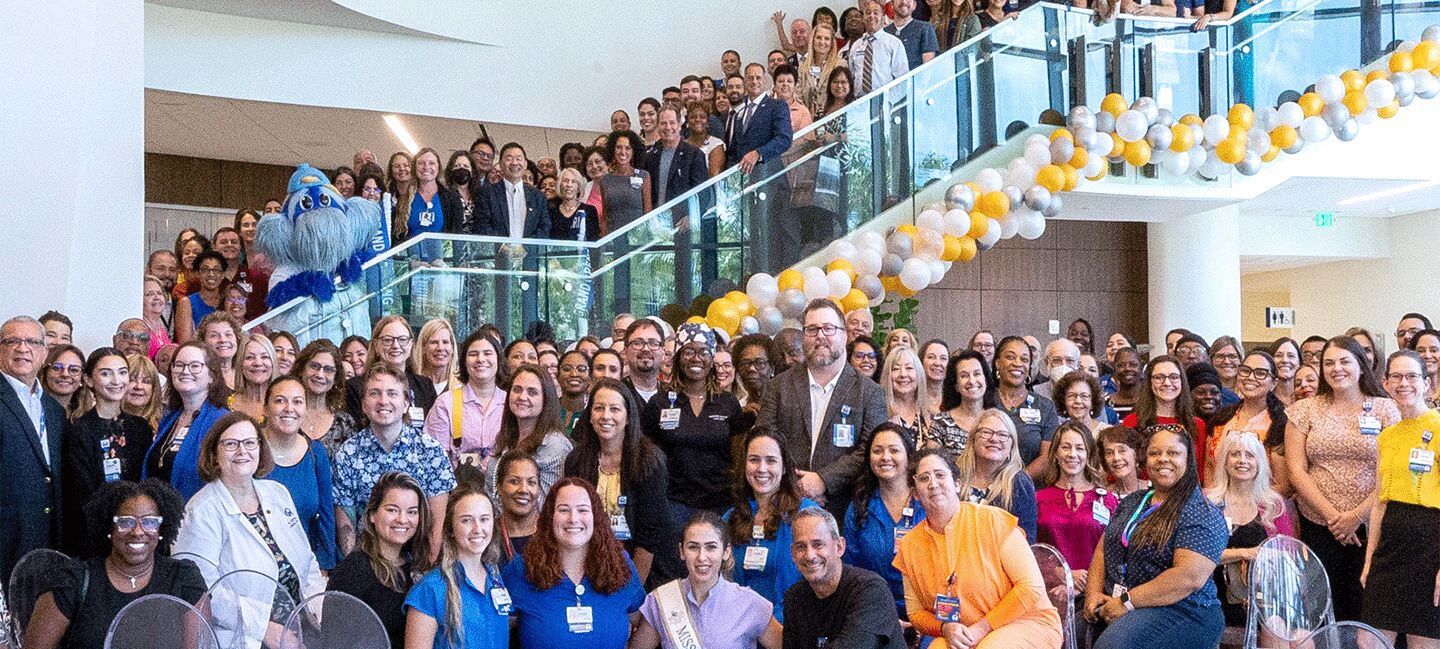 Team members celebrate the grand opening of Moffitt McKinley Hospital in July 2023.