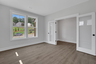 study with french doors and hard surface flooring