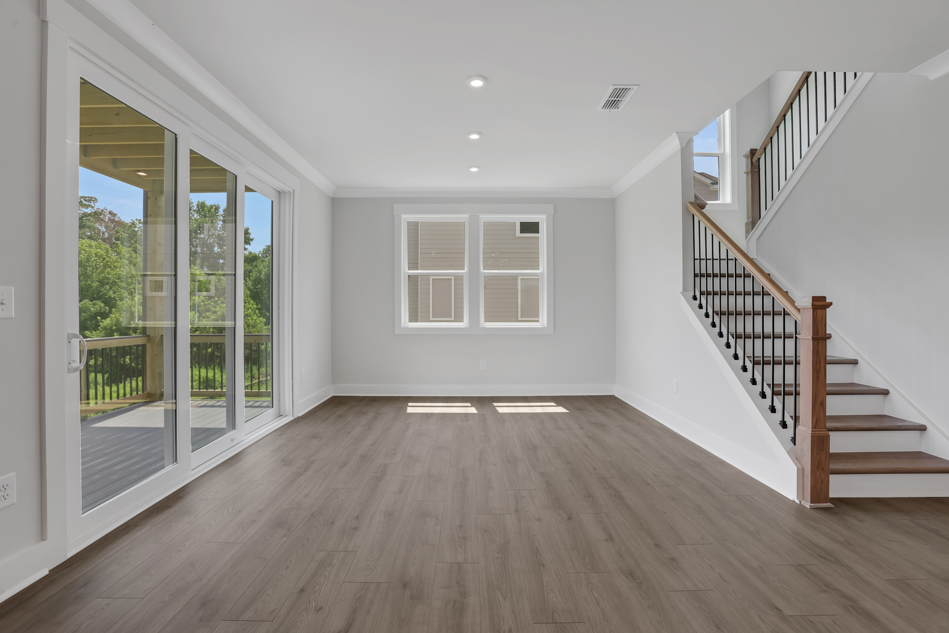 dining room with hard surface flooring and windows