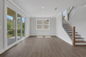 dining room with hard surface flooring and windows