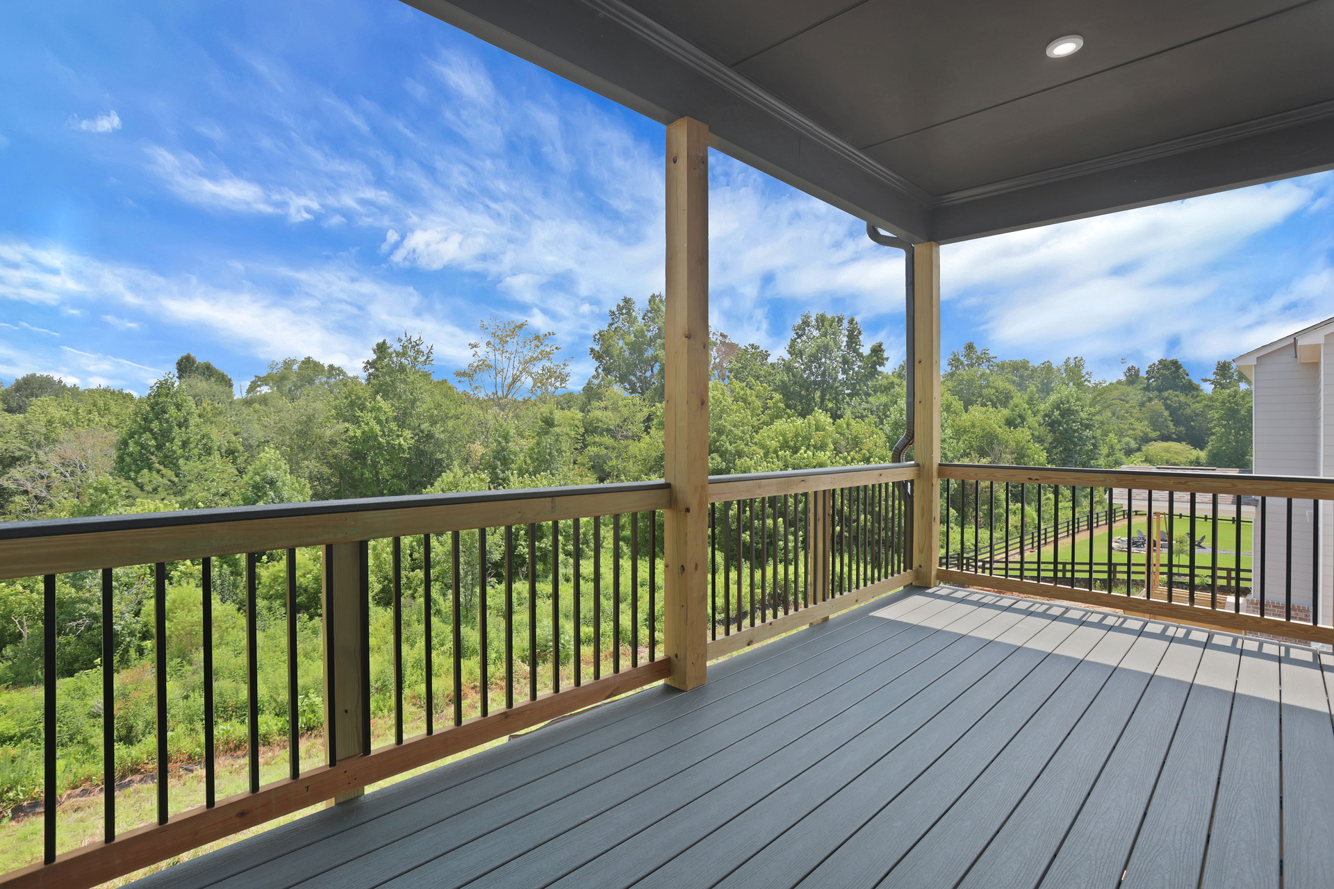covered balcony off of primary suite