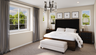 primary bedroom with neutral floors and large windows