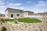backyard with desert landscaping and seating area