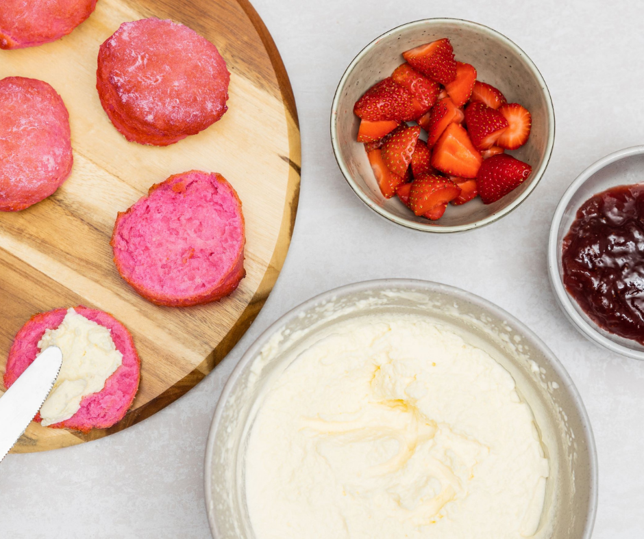 Mothers Day Recipe, Pink Lemonade Scones, Step 10 cut scones in half and fill with freshly whipped cream, jam and strawberries.